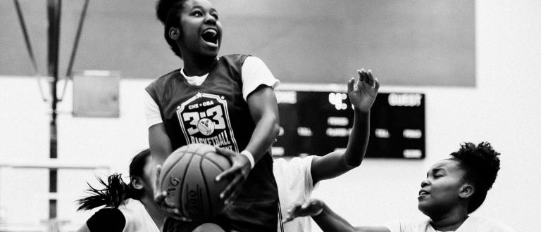 Young girls playing basketball