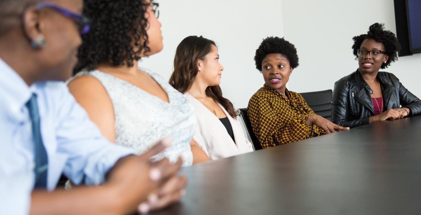 Women of colour in a meeting